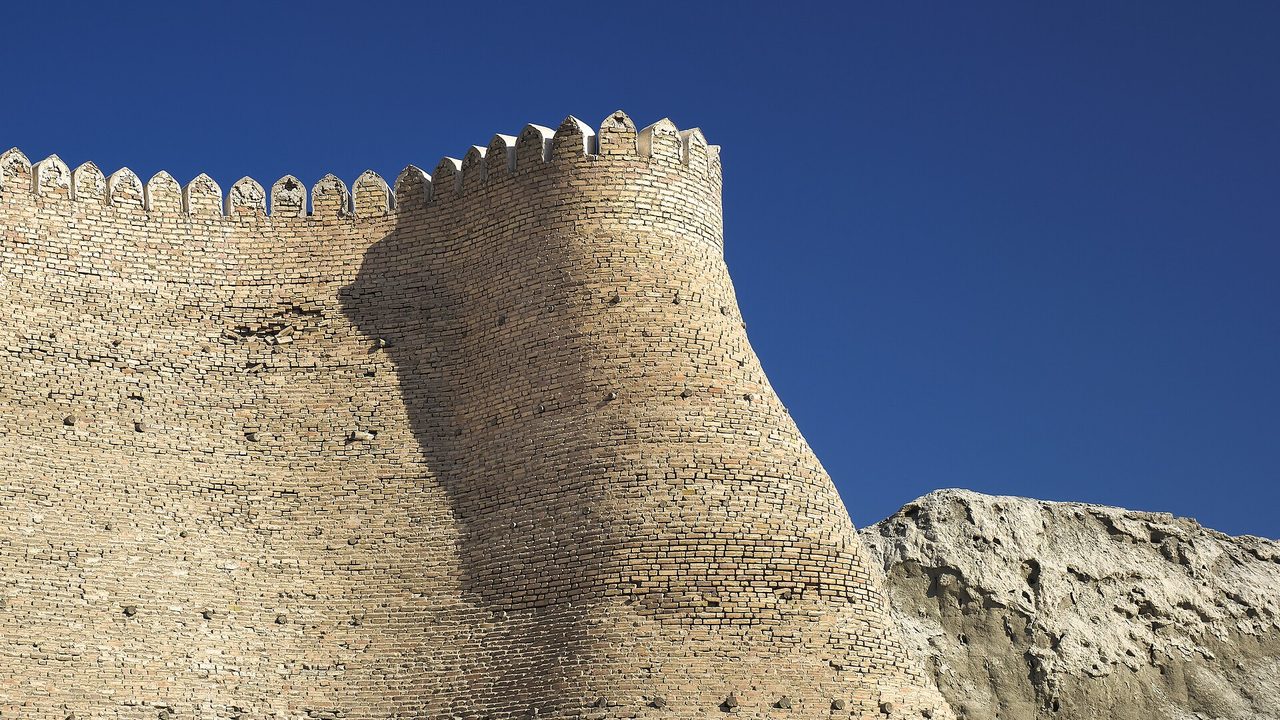 The crenellated walls of the Ark fortress in Bukhara