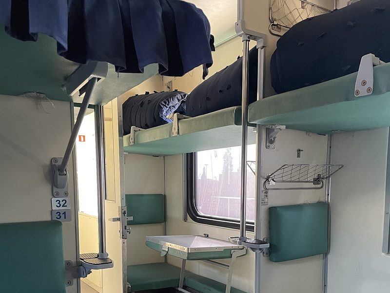 Closed four-berth sleeper compartment on an overnight Uzbekistan train, Khiva to Bukhara