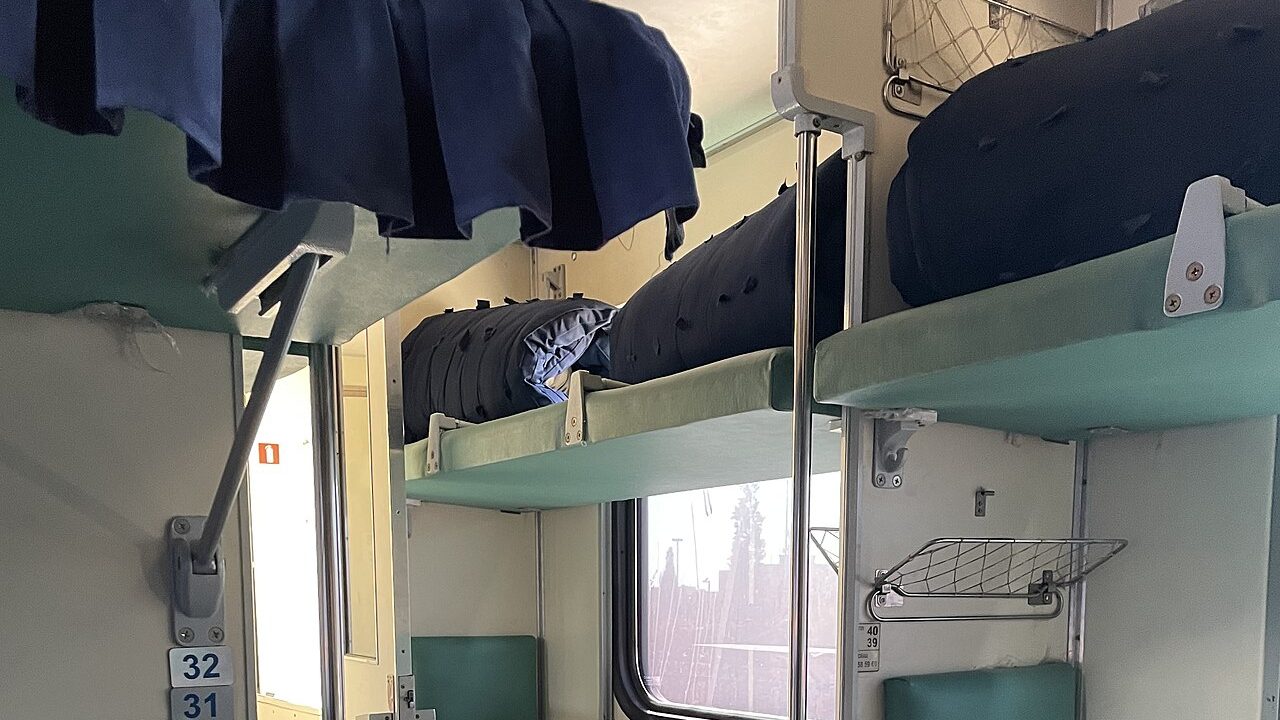 Closed four-berth sleeper compartment on an overnight Uzbekistan train, Khiva to Bukhara